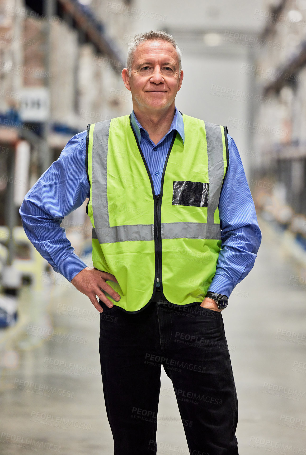 Buy stock photo Shot of a mature man working in a warehouse