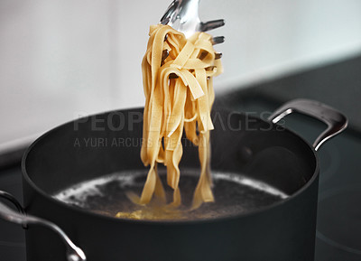 Buy stock photo Shot of fresh pasta being made at home