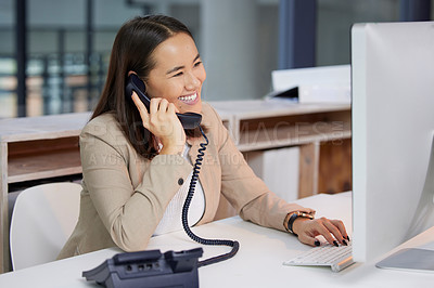 Buy stock photo Telephone, computer and business woman, secretary or communication worker talking, helping or support. Professional asian person on desktop and phone call discussion for contact us or job information