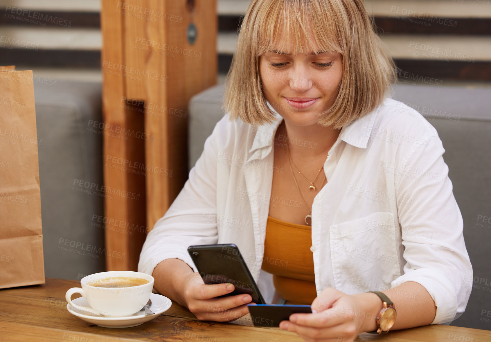 Buy stock photo Woman, cellphone and credit card with smile, online shopping and ecommerce for retail sale. Shopper, smartphone and technology for store discount or purchase for internet banking in cafe with coffee