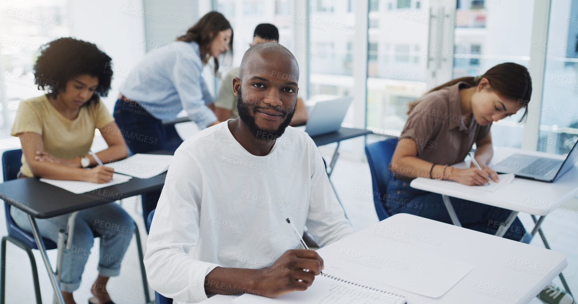 Buy stock photo Black man, student portrait and university class with learning for college test. Book, school study and African male person thinking, writing and planning lecture notes for studying with a smile