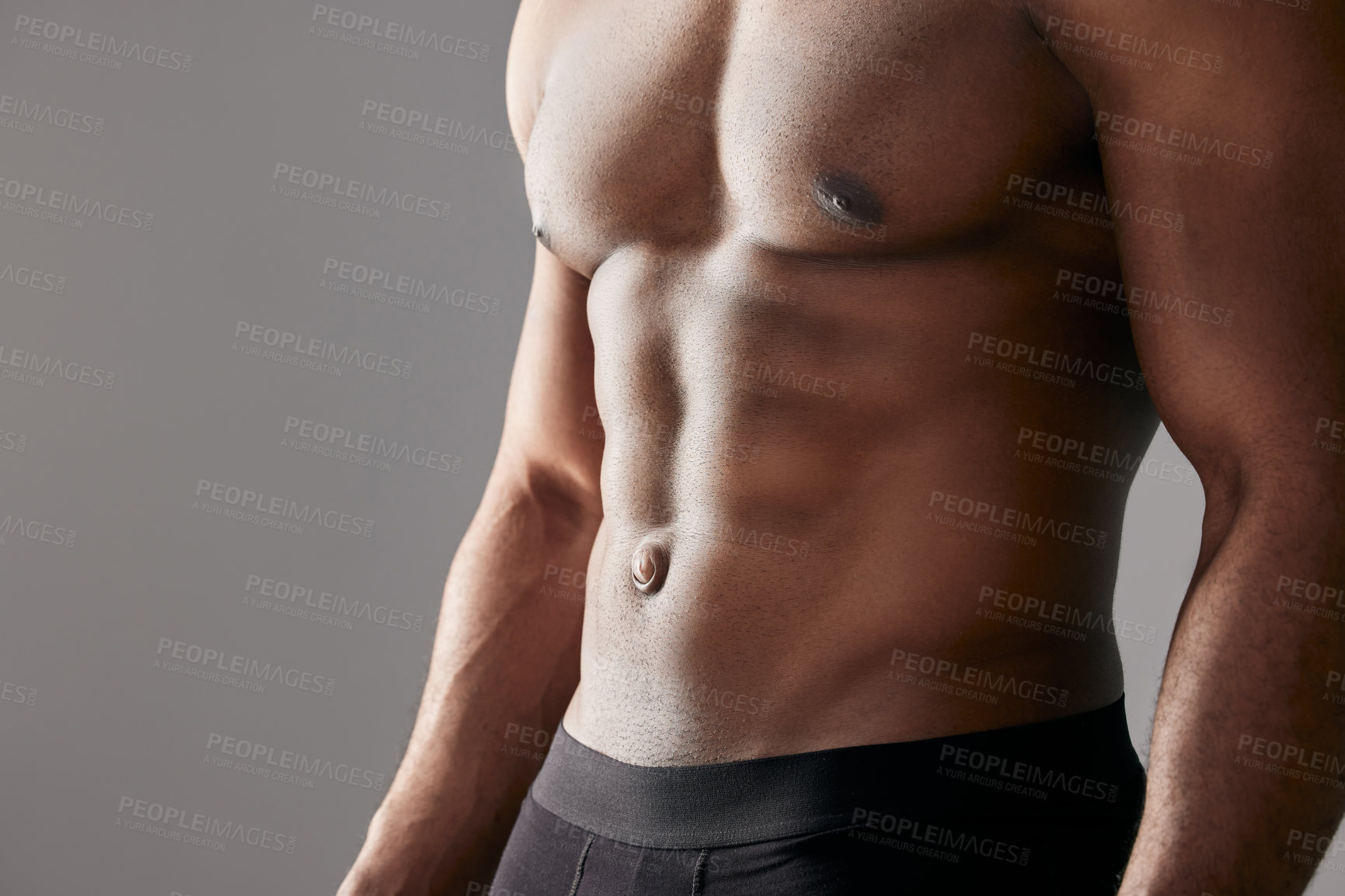 Buy stock photo Abdomen, muscle and man in studio for fitness, exercise and body health closeup isolated on white background. Abs, shirtless and strong bodybuilder workout for energy, sport or power for wellness