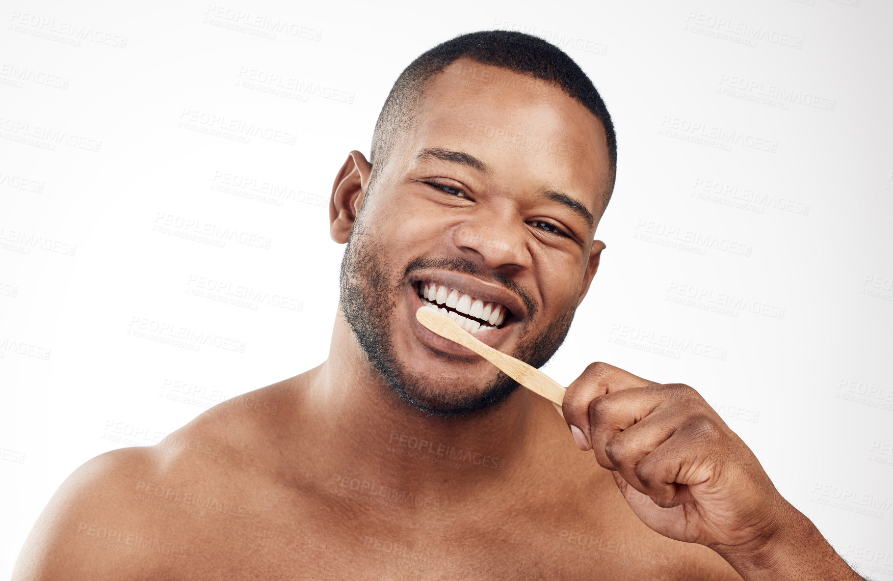 Buy stock photo Black man, portrait and brushing teeth or toothbrush cleaning for healthy gums, hygiene or white background. Male person, face and whitening routine in studio for self care or mockup, plaque or oral