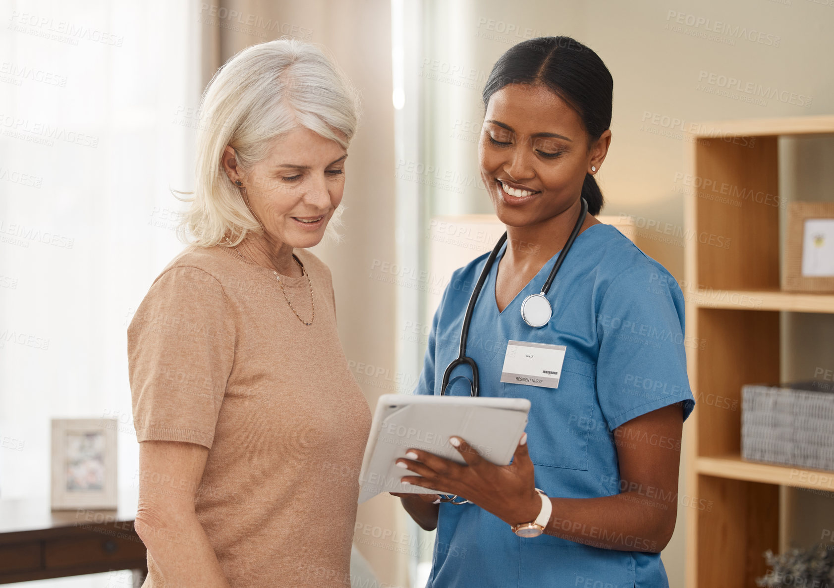 Buy stock photo Mature woman, nurse and tablet in cardiovascular, healthcare or wellness with patient records. People, medic and tech for support, medicine or results as professional in clinic or hospital for advice