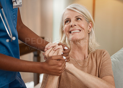 Buy stock photo Shot of a doctor having a consultation with a senior woman at home