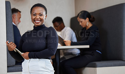 Buy stock photo Shot of a young businesswoman working from a cafe