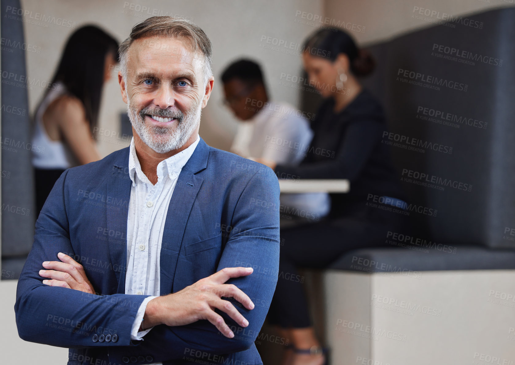 Buy stock photo Shot of a mature businessman working from a cafe