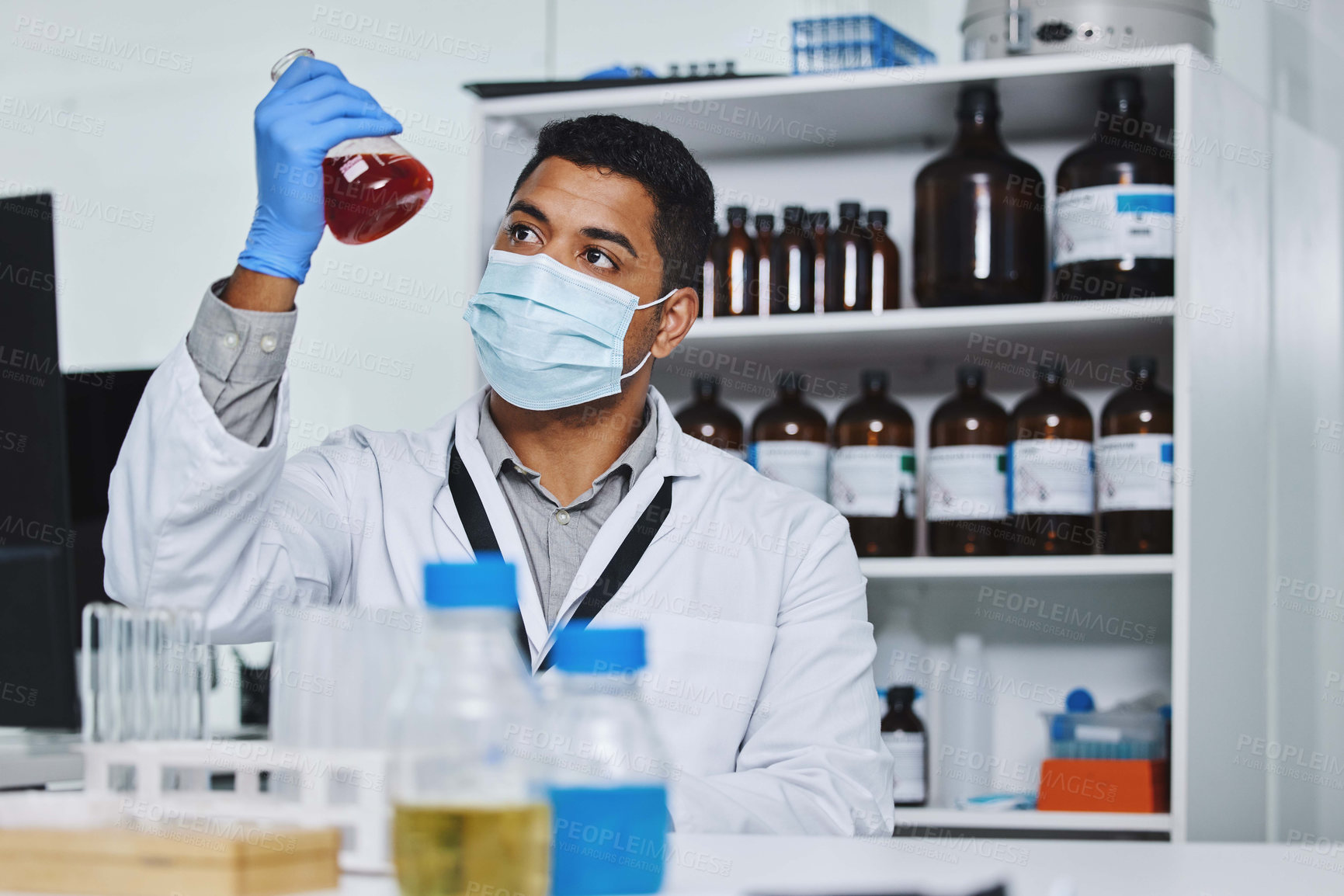 Buy stock photo Healthcare, scientist and man with beaker, liquid and thinking for blood work or pathology in lab. Medicine, male person and researcher with glass container for pharmaceutical or medical innovation