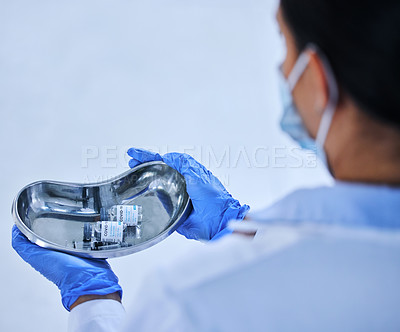 Buy stock photo Scientist, hands and container for covid vaccine, safety and innovation in medicine for pandemic. Healthcare worker, glass vials and medical for research with virus, chemistry development in lab