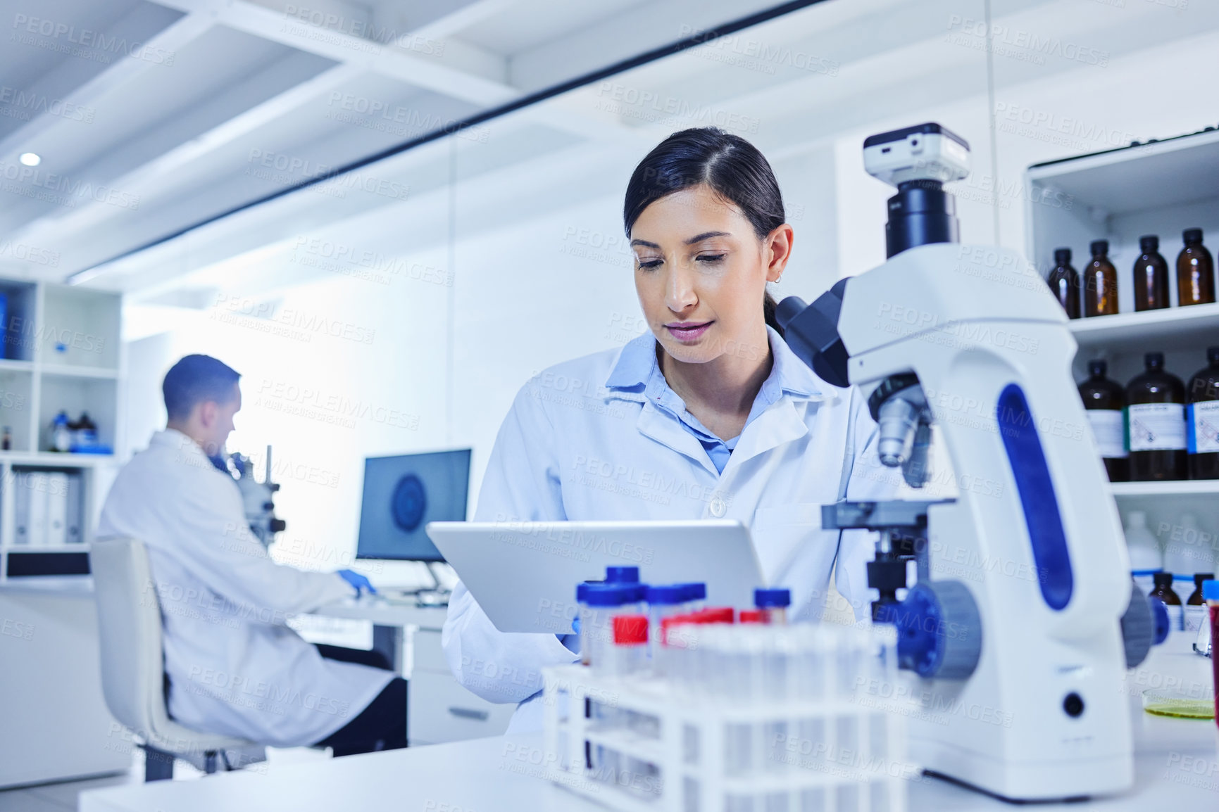 Buy stock photo Woman, technician and medical research for covid 19, vaccine and tablet with lab equipment for pharma innovation. Female person, scientist and tech in healthcare for chemistry in forensic for results