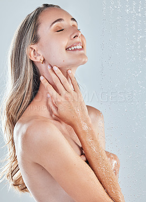 Buy stock photo Studio, shower and woman washing for hygiene with wellness, dermatology and safety from bacteria. Skincare, water drops and model with cleaning body for skin glow and spa aesthetic by grey background