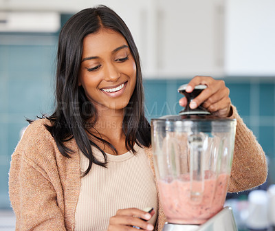 Buy stock photo Woman, liquid in blender for smoothie and drink, detox and healthy shake for diet, weight loss and vegan. Fresh, organic and fruit cocktail in kitchen at home for nutrition, vitamins and smile