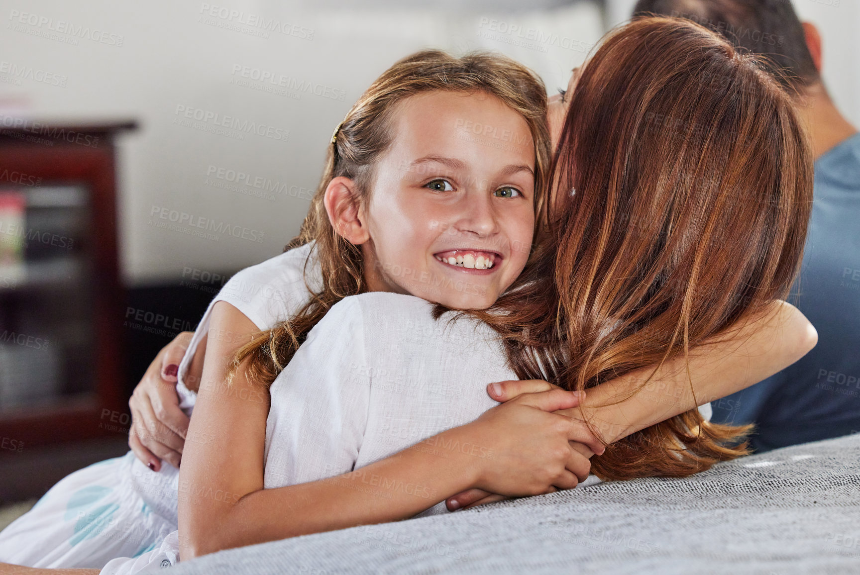 Buy stock photo Portrait, mother and hug happy kid in home for love, care and family bonding together in living room. Face, smile and girl embrace mom for support, connection and relationship of child with parents