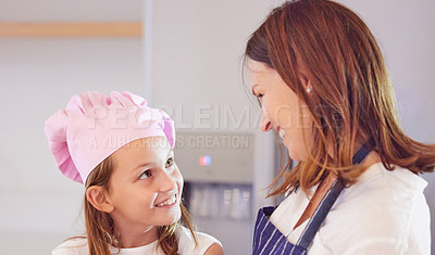 Buy stock photo Baking, face and family in kitchen of home together learning how to cook or prepare fresh pastry. Love, smile or happy with mama and girl child in apartment to bake ingredients, food or recipe