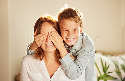 Buy stock photo Boy, mom and cover eyes for surprise with smile in portrait for bonding, care and connection in home. Mother, child and happy for games, playful and relax together in lounge with love at family house