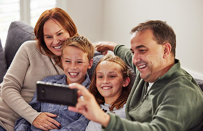 Buy stock photo Smile, sofa and family with selfie in living room for social media, update and memory of vacation. Mother, father and children with digital photography at home for care, love and happiness together