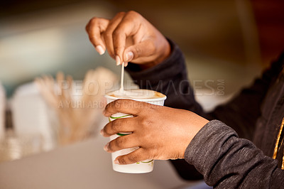 Buy stock photo Shot of an unrecognizable person stirring a cup of coffee