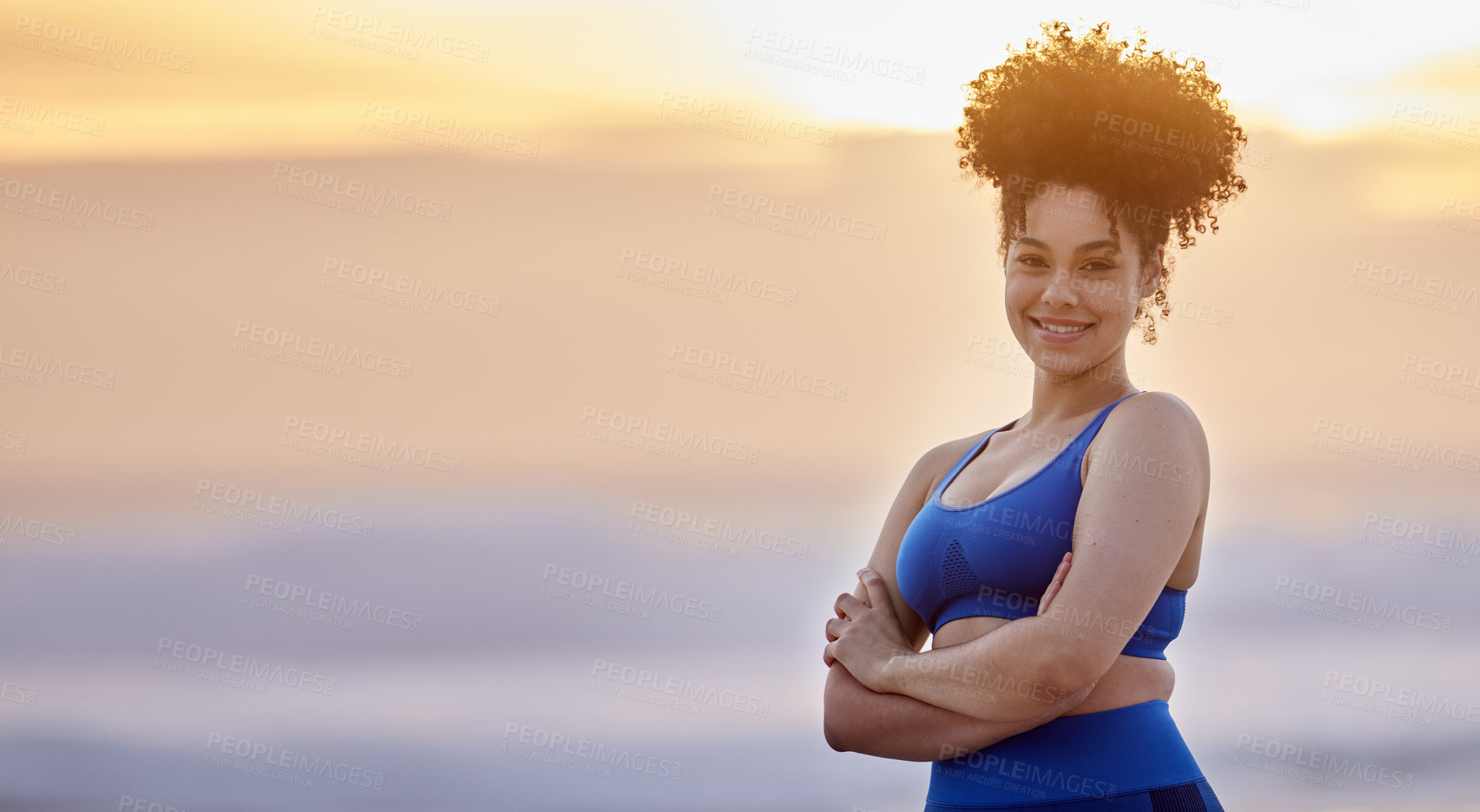 Buy stock photo Shot of a young female doing yoga on the beach