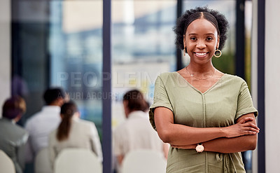 Buy stock photo Shot of a businesswoman smiling at a business meeting in a modern office