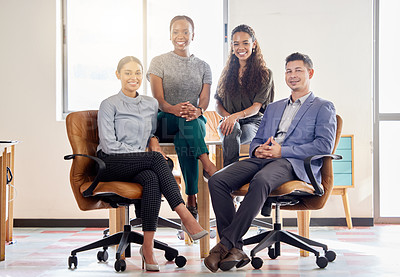 Buy stock photo Shot of a group of colleagues in an office at work