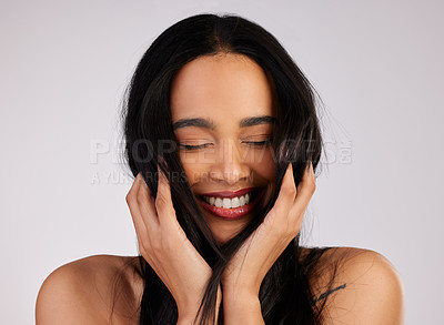 Buy stock photo Hair care, smile and woman with eyes closed in studio for growth, keratin treatment or shampoo on white background. Hairstyle, aesthetic and happy model for satisfaction, cosmetics or glowing texture