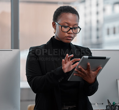 Buy stock photo Black woman, tablet and working on creative project at startup, web designer with research and focus at office. Website development, technology and digital marketing for blog at media company