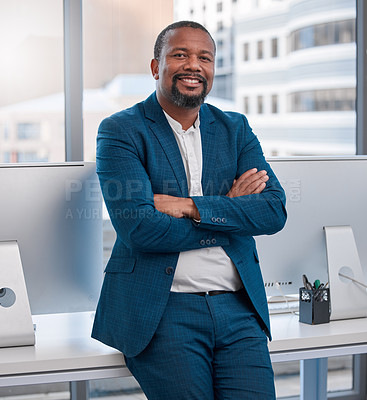 Buy stock photo Shot of a young man standing in a modern office
