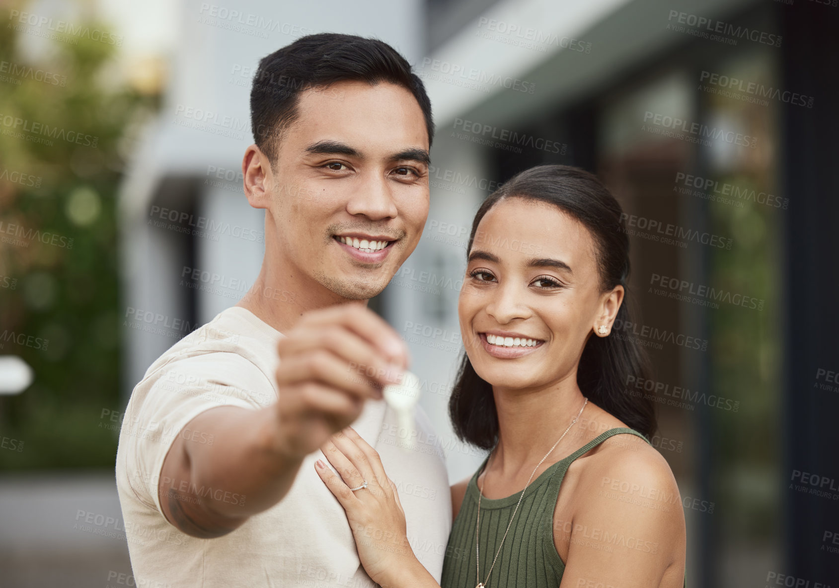 Buy stock photo Couple, new home and happy with key, property investment or purchase and mortgage with partners. Ownership, people and relationship with achievement and house goal, buying and sold real estate