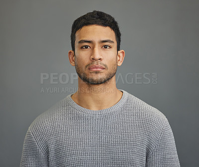 Buy stock photo Serious man, casual style and portrait with modern fashion in a studio. Male model, grey background and young person from Philippines of a handsome Asian adult with confidence, attitude and jersey
