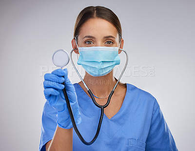 Buy stock photo Mask, doctor and woman with stethoscope, portrait and safety with gloves and PPE for healthcare. White background, medical and person with help, studio and healthy in clinic and hands in hospital