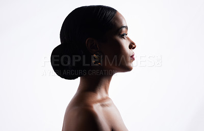 Buy stock photo Shot of an attractive young woman posing against a white background in the studio
