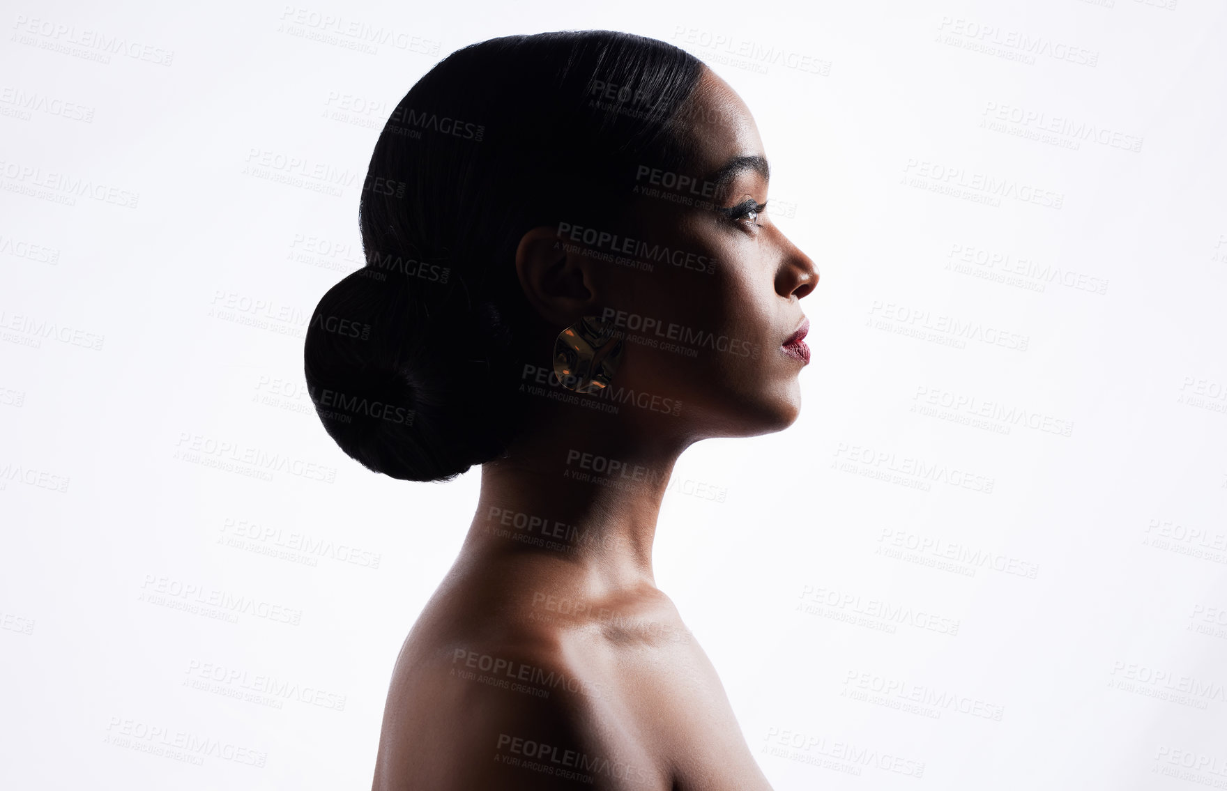 Buy stock photo Shot of an attractive young woman posing against a white background in the studio