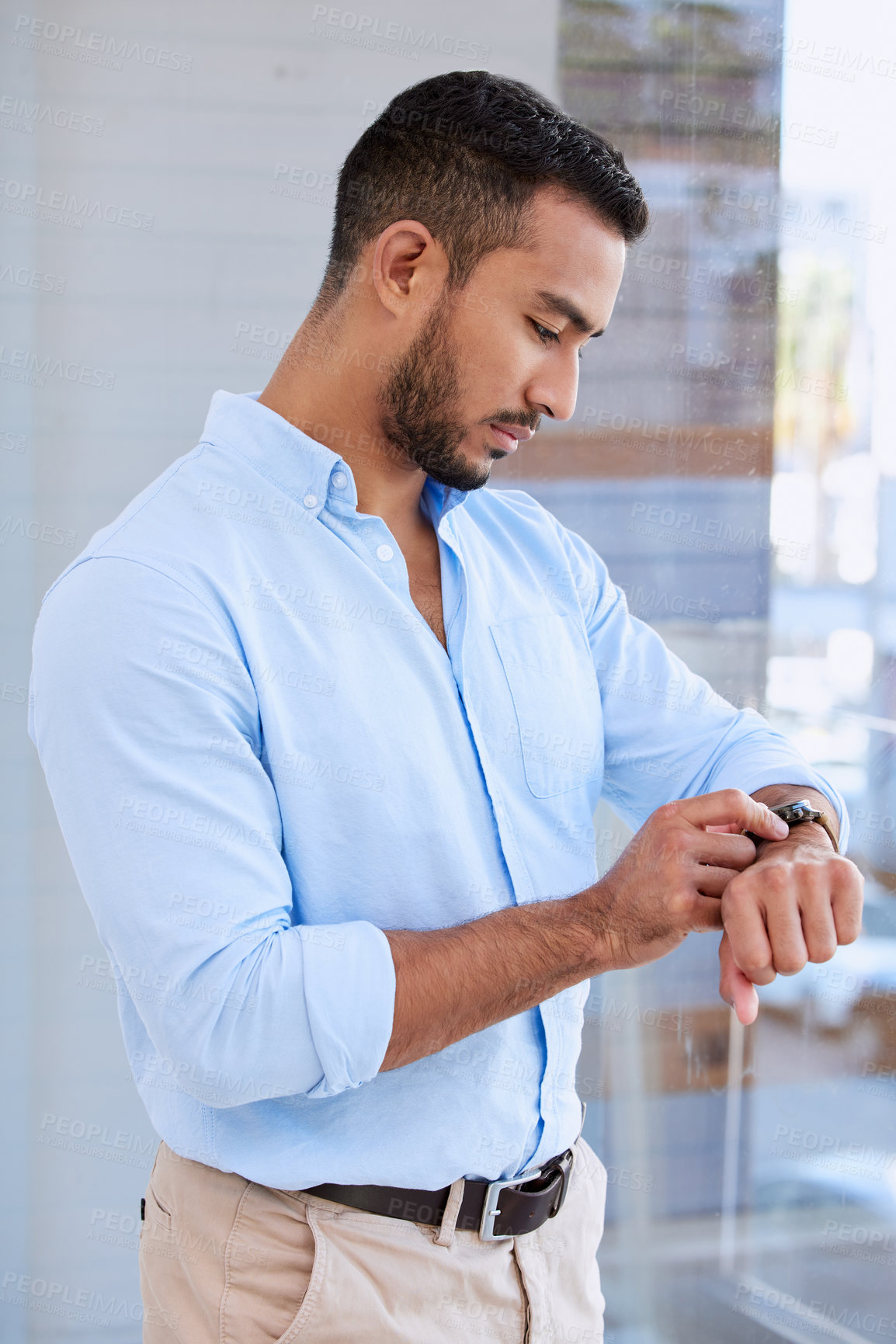 Buy stock photo Man, window and check time in office with wristwatch, thinking or alarm for reminder at startup. Entrepreneur, person and watch for schedule, meeting or appointment with idea at creative media agency