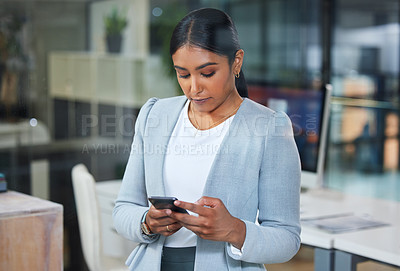 Buy stock photo Phone, corporate and business woman typing an email or search the internet, web and website in an office. Smartphone, online and employee or person on social media to connect or network on mobile app