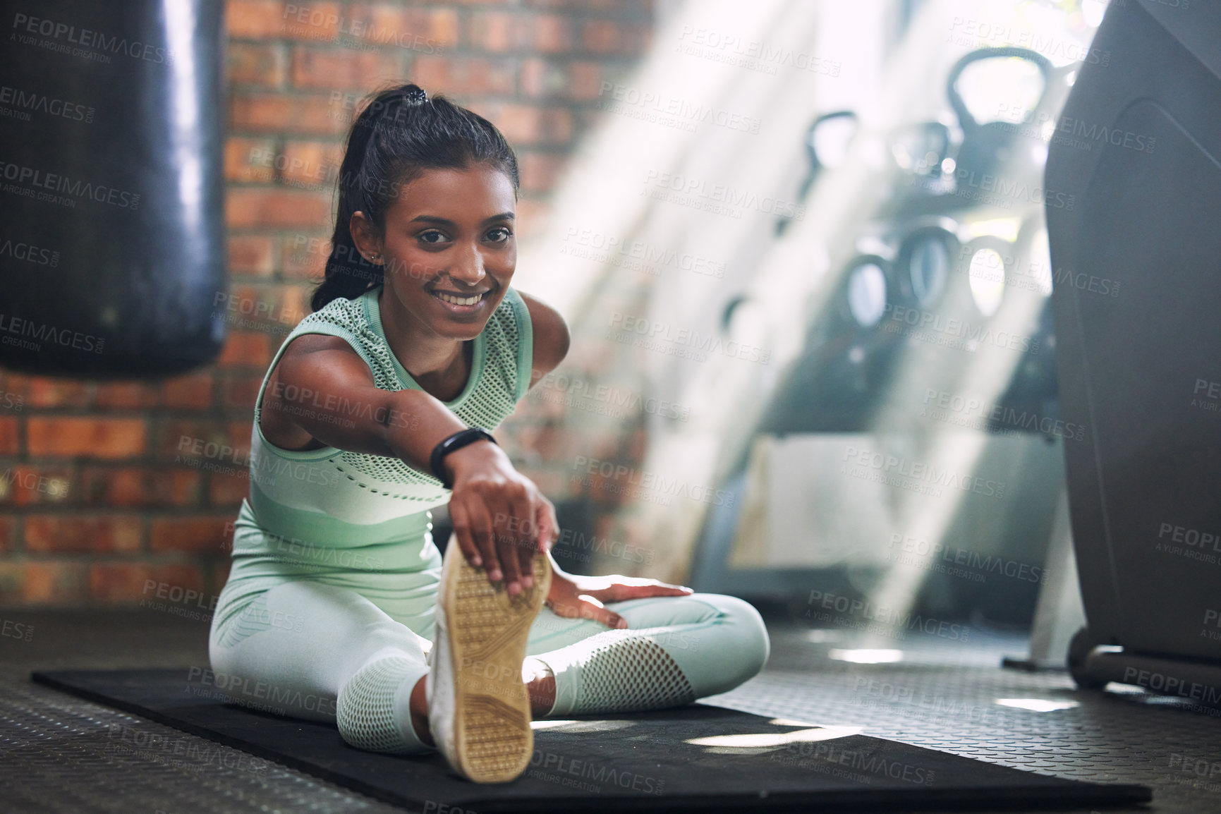 Buy stock photo Gym, fitness or portrait of happy woman stretching legs for a workout or body movement for wellness. Smile, athlete or healthy girl smiling in exercise training warm up for flexibility or mobility