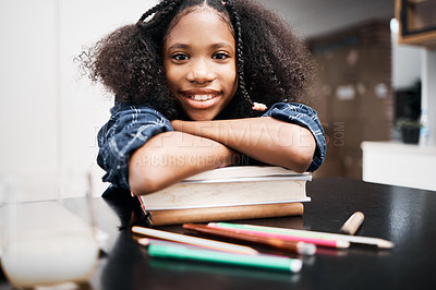 Buy stock photo Child, school books and happy for education, learning and development at a table in a house. Face portrait of an african girl kid or student with a smile, knowledge and happiness while studying
