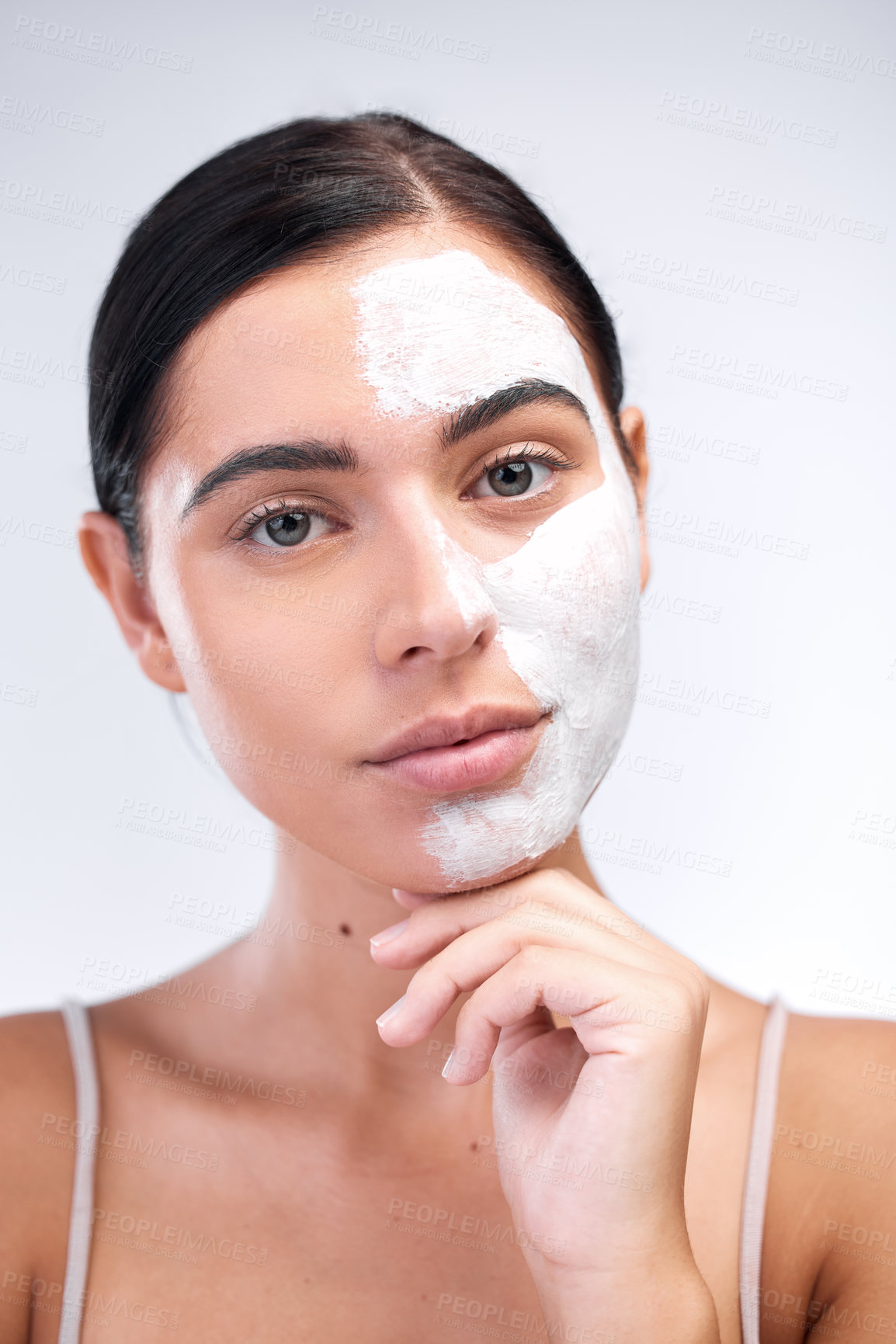 Buy stock photo Woman, portrait and clay mask in studio, cleaning and half skincare to exfoliate on white background. Female person, half cosmetics and acne or facial treatment, purity detox and comparison of result