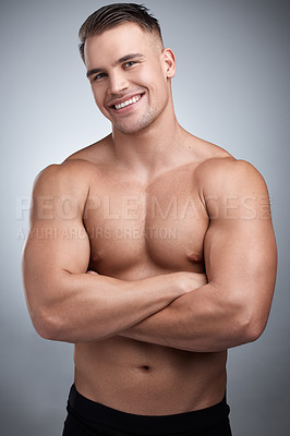 Buy stock photo Man, muscular torso and portrait in studio for fitness, gym or workout for physical training or exercise. Model, smile and shirtless for bodybuilder and confident with muscle growth for wellness 