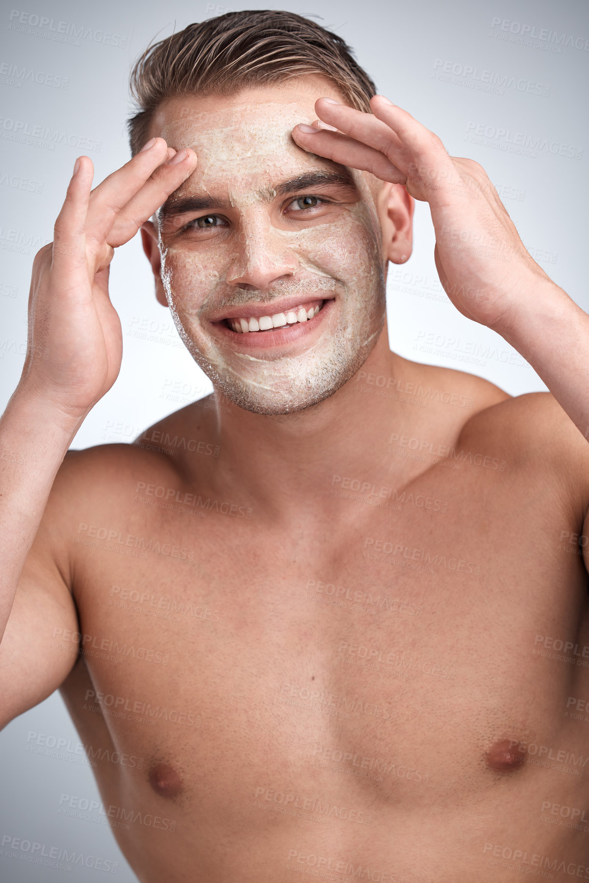 Buy stock photo Skincare, face mask and portrait of man in studio with cream for dermatology, wellness or treatment on gray background. Cosmetics, smile and male model with lotion for grooming, routine or product 