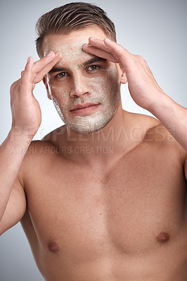 Buy stock photo Grooming, face mask and portrait of man in studio with cream for dermatology, wellness or treatment on gray background. Cosmetics, cleaning and male model with lotion for skincare, routine or product