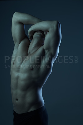 Buy stock photo Bodybuilder man, stretching and muscle in studio for wellness, healthy body or art deco on black background. Male person, fitness and performance or power for health while masculine and sensual