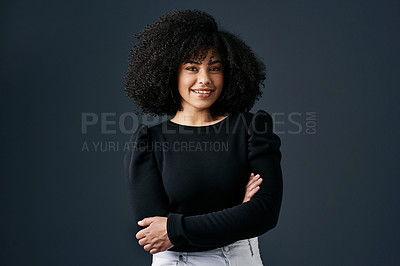 Buy stock photo Shot of a young businesswoman against a studio background