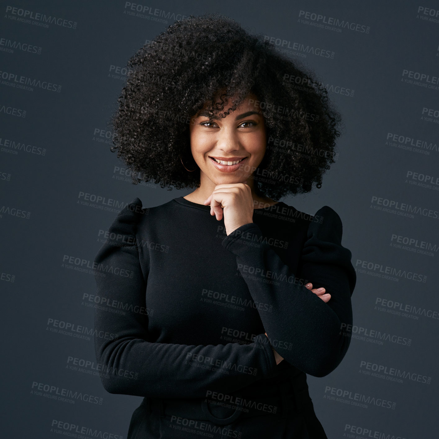 Buy stock photo Shot of a young businesswoman against a studio background