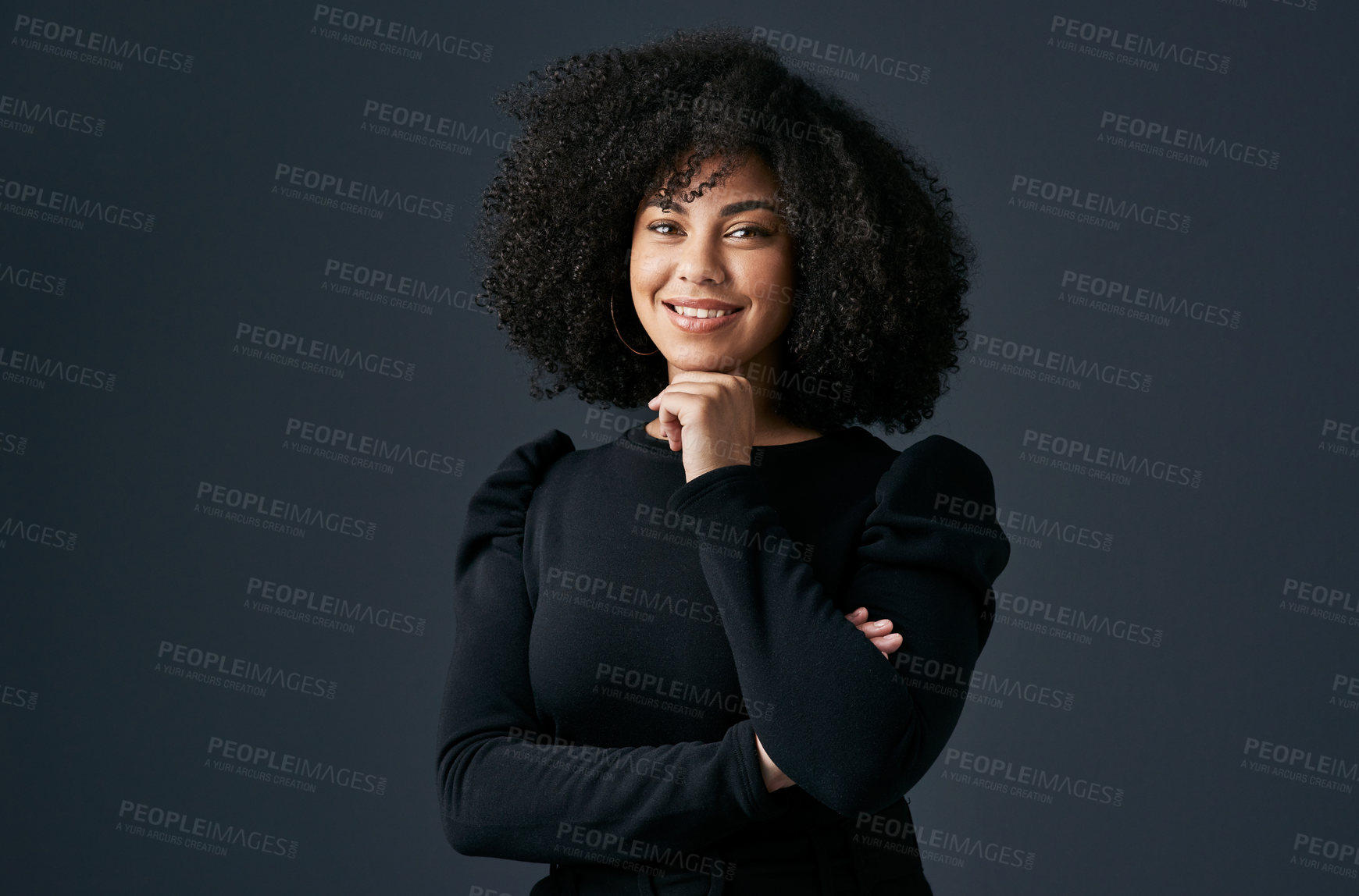 Buy stock photo Shot of a young businesswoman against a studio background