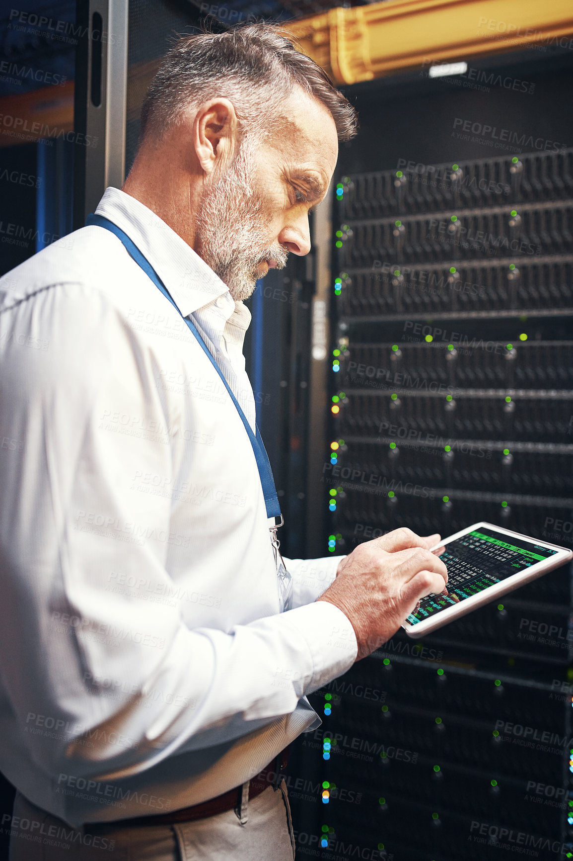 Buy stock photo Engineer, man and server room inspection with tablet for CPU usage, track assets or IT support. Technician, mature person or tech in data center for system backup, network analysis or diagnostic code