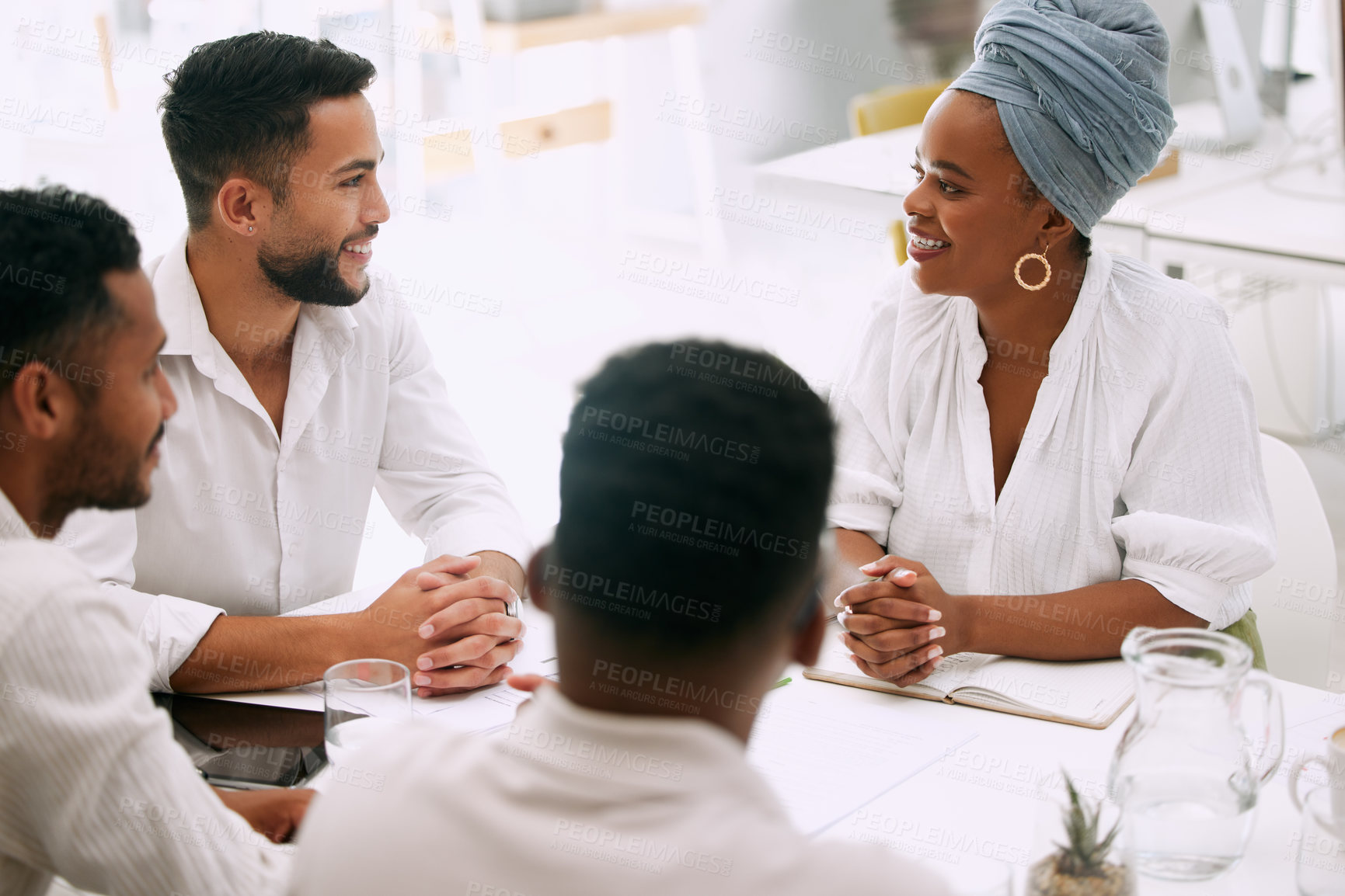 Buy stock photo Shot of businesspeople having a meeting in a boardroom at work