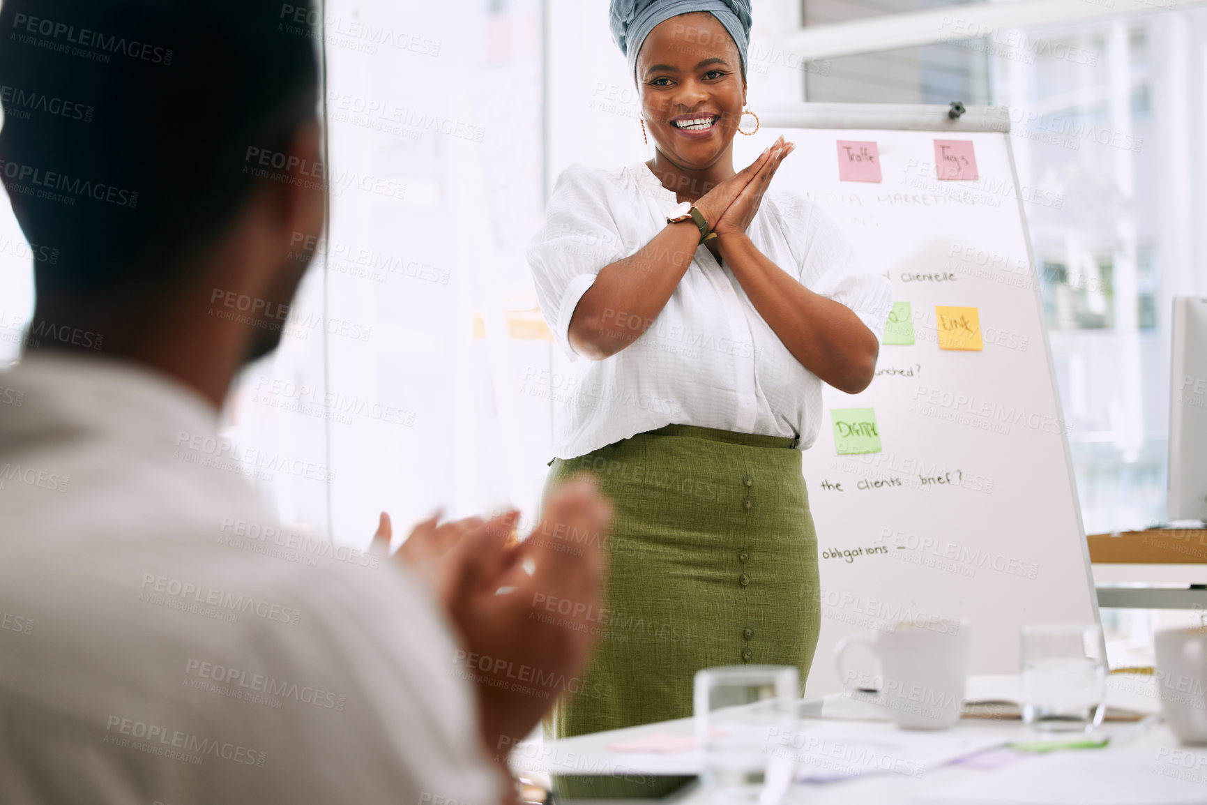 Buy stock photo Shot of businesspeople having a meeting in a boardroom at work