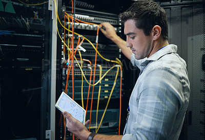 Buy stock photo Server room, engineer and man working with a tablet for programming, cybersecurity or cable maintenance. Technician person in a datacenter for network, software or system upgrade with technology app
