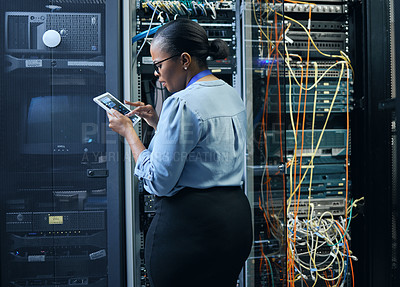 Buy stock photo Server room, woman and engineer with tablet for cybersecurity, programming or cable maintenance. Black female technician in datacenter for network, software or system upgrade with IT app and internet