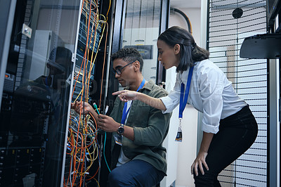 Buy stock photo IT people, engineer or server room cable for programming or connection maintenance. Man and woman technician in datacenter for network, cybersecurity software or data center problem or system upgrade